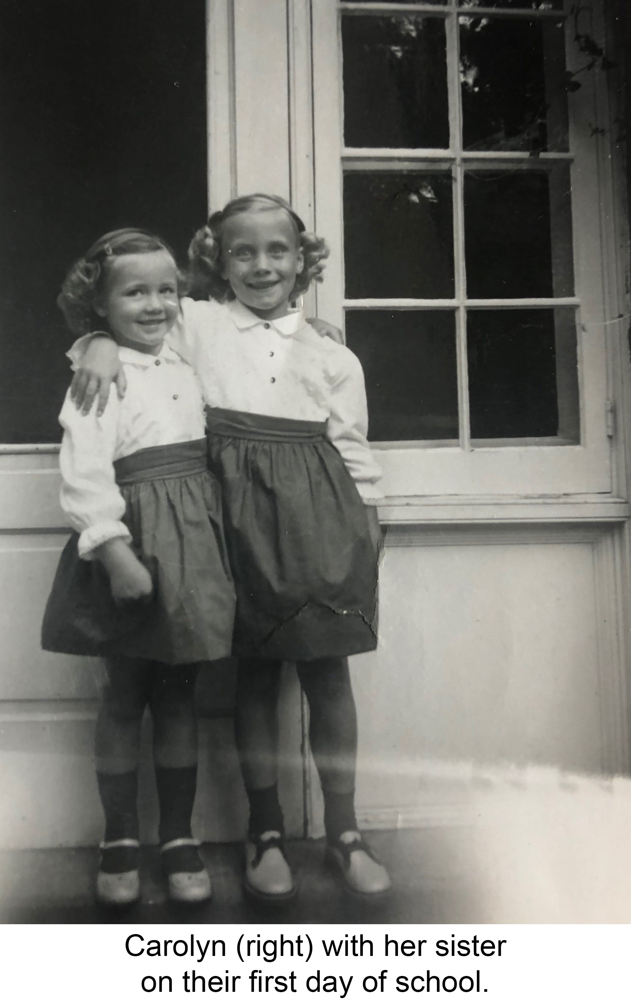 Carolyn with her sister on their first day of school